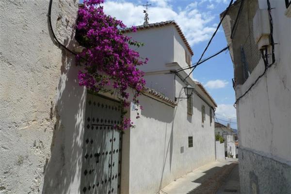 Por calle Iglesia hasta Casa Tagomago, casa rural Restábal, Granada